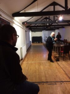 A picture containing indoor, person Description automatically generated