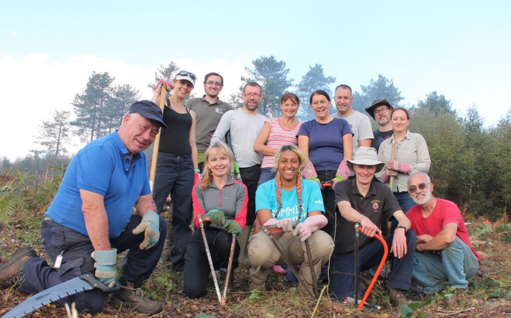 A group of people posing for a photo

Description automatically generated