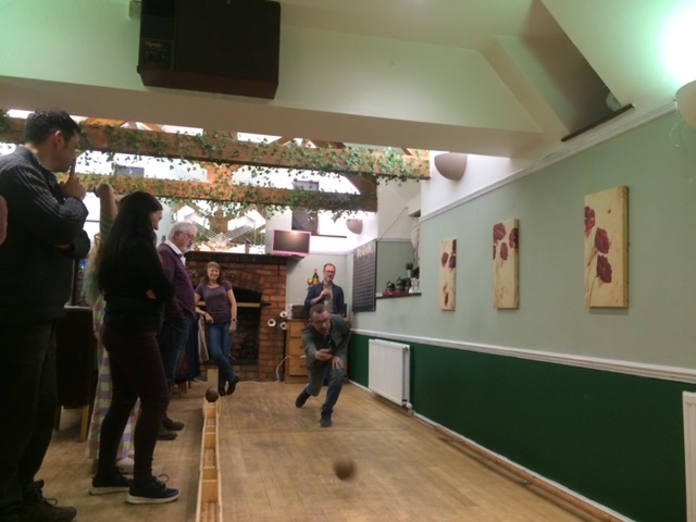 A group of people in a room

Description automatically generated with medium confidence